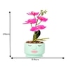 Artistic  Face Planter With Pink Artificial Orchids