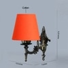 Devansh Metal Electric Wall Light in Antique Gold Colour with Orange Shade Count of 1 Light