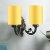 Devansh Metal Electric Wall Light in Antique Gold Colour with Yellow Shade Count of 2 Lights