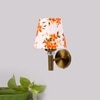 Devansh Metal Electric Wall Light in Gold Colour with Multi Shade Count of 1 Light