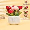 Red Artificial Flowers With Modern Planter