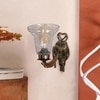 Devansh Metal Electric Wall Light in Antique gold Colour with Transparent Shade Count of 1 Light