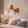 Devansh Metal Electric Wall Light in Gold Colour with Orange Shade Count of 2 Lights