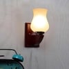 Devansh Solid Wood Electric Wall Light in White Colour with White Shade Count of 1 Light