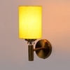 Devansh Metal Electric Wall Light in Gold Colour with Yellow Shade Count of 1 Light
