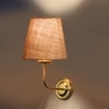 Devansh Metal Electric Wall Light in Gold Colour with Beige Shade Count of 1 Light