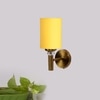 Devansh Metal Electric Wall Light in Gold Colour with Yellow Shade Count of 1 Light