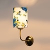 Devansh Metal Electric Wall Light in Gold Colour with Multi Shade Count of 1 Light
