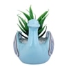 Fern Plant Inside An Artistic Blue Swan Ceramic Pot