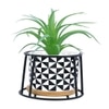 Highly Attractive Faux Plant With A Geometric Patterned Ceramic Pot In A Stand