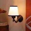 Devansh Metal Electric Wall Light in Antique Gold Colour with White & Black Shade Count of 1 Light