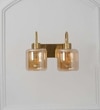 Hendrik 2 Light Wall Fitting In Brass Finish Metal With Amber Glass
