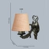 Devansh Metal Electric Wall Light in Antique Gold Colour with Beige Shade Count of 1 Light