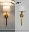 Parker Single Light Wall Fitting In Antique Brass Finish Metal With White Cotton Shade