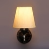 Devansh Metal Electric Wall Light in Antique Gold Colour with off-white Shade Count of 1 Light