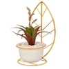 Red And Green Artificial Plant With White And Gold Ceramic Pot