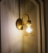 Hendrik Single Light Wall Fitting In Brass  Finish Metal With Amber Glass