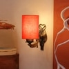 Devansh Metal Electric Wall Light in Antique Gold Colour with Orange Shade Count of 1 Light