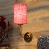 Devansh Metal Electric Wall Light in Gold Colour with Pink Shade Count of 1 Light