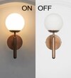 Divina Single Light Wall Fitting In Antique Brass Finish With Opal Frosted White Glass