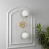 Balts Twin Brass Wall Light with Opal Glass Globe Shades