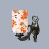 Devansh Metal Electric Wall Light in Antique Gold Colour with Multi Shade Count of 1 Light