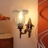 Devansh Metal Electric Wall Light in Antique gold Colour with Transparent Shade Count of 1 Light