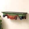 Multishade Colour Solid Wood Handcarved Navaranga Floating Wall Shelf with distres finish by DisooFashions