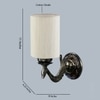 Devansh Metal Electric Wall Light in Antique Gold Colour with off-white Shade Count of 1 Light