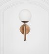 Divina Single Light Wall Fitting In Antique Brass Finish With Opal Frosted White Glass