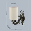 Devansh Metal Electric Wall Light in Antique Gold Colour with off-white Shade Count of 1 Light