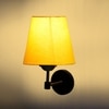 Devansh Metal Electric Wall Light in Black Colour with Yellow Shade Count of 1 Light