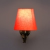 Devansh Metal Electric Wall Light in Antique Gold Colour with Orange Shade Count of 1 Light