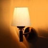 Devansh Metal Electric Wall Light in Gold Colour with off-white Shade Count of 1 Light