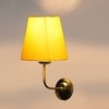 Devansh Metal Electric Wall Light in Gold Colour with Yellow Shade Count of 1 Light