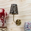 Devansh Metal Electric Wall Light in Gold Colour with Black Shade Count of 1 Light