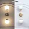 Balts Twin Brass Wall Light with Opal Glass Globe Shades
