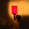 Devansh Metal Electric Wall Light in Gold Colour with Red Shade Count of 1 Light