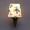 Devansh Metal Electric Wall Light in Antique Gold Colour with Multi Shade Count of 1 Light