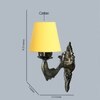Devansh Metal Electric Wall Light in Antique Gold Colour with Yellow Shade Count of 1 Light