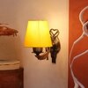 Devansh Metal Electric Wall Light in Antique Gold Colour with Yellow Shade Count of 1 Light