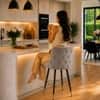 Doe Buck Upholstered Counter Height Bar Stool in Grey Colour with Gold Accents
