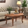 Nitara Oval Solid Wood Coffee Table In Teak Finish