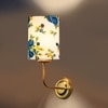 Devansh Metal Electric Wall Light in Gold Colour with Multi Shade Count of 1 Light