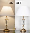 Ashurst Black & Antique Brass Finish Metal And Clear Crystal Glass Table Lamp With White Cotton Shade