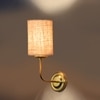 Devansh Metal Electric Wall Light in Gold Colour with Beige Shade Count of 1 Light