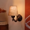 Devansh Metal Electric Wall Light in Antique Gold Colour with Beige Shade Count of 1 Light