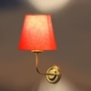 Devansh Metal Electric Wall Light in Gold Colour with Orange Shade Count of 1 Light
