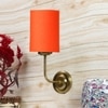 Devansh Metal Electric Wall Light in Gold Colour with Orange Shade Count of 1 Light