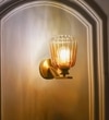 Brinley Single Light Wall Fitting In Brass  Finish Metal With Amber Glass